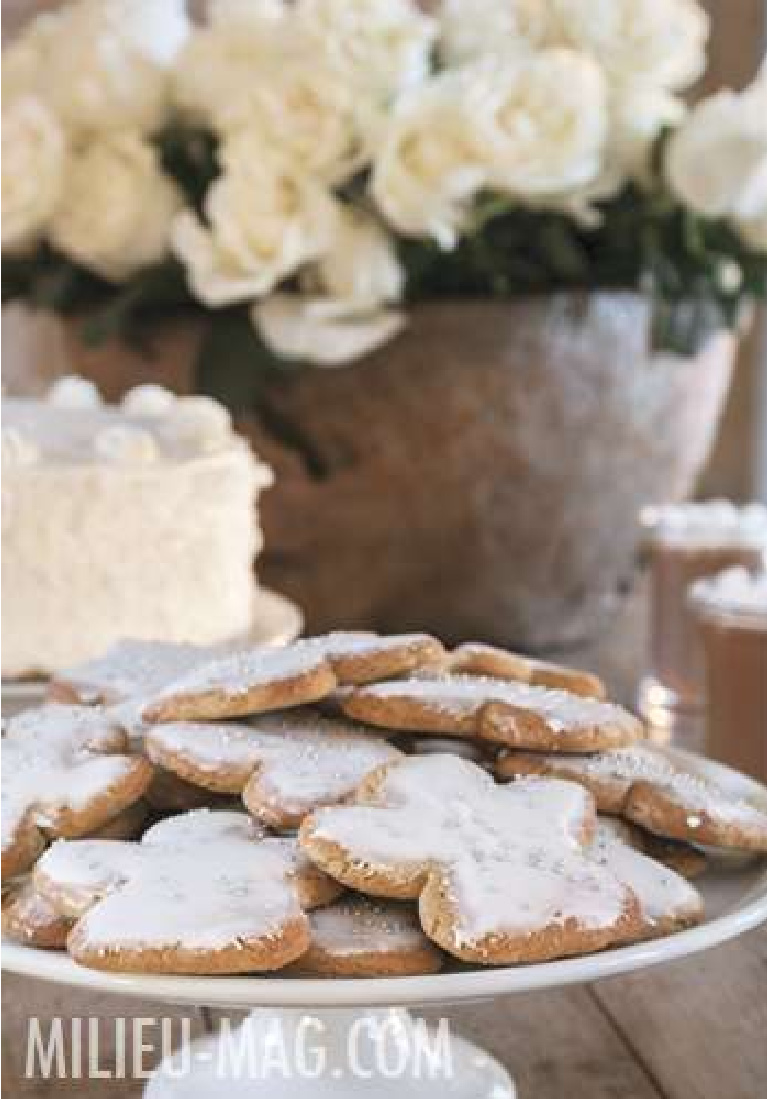 Angel cookies with white icing in Pamela Pierce's Houston home decorated for Christmas - Milieu magazine. #whitechristmas #christmascookies #frenchcountry #whitechristmas #pamelapierce