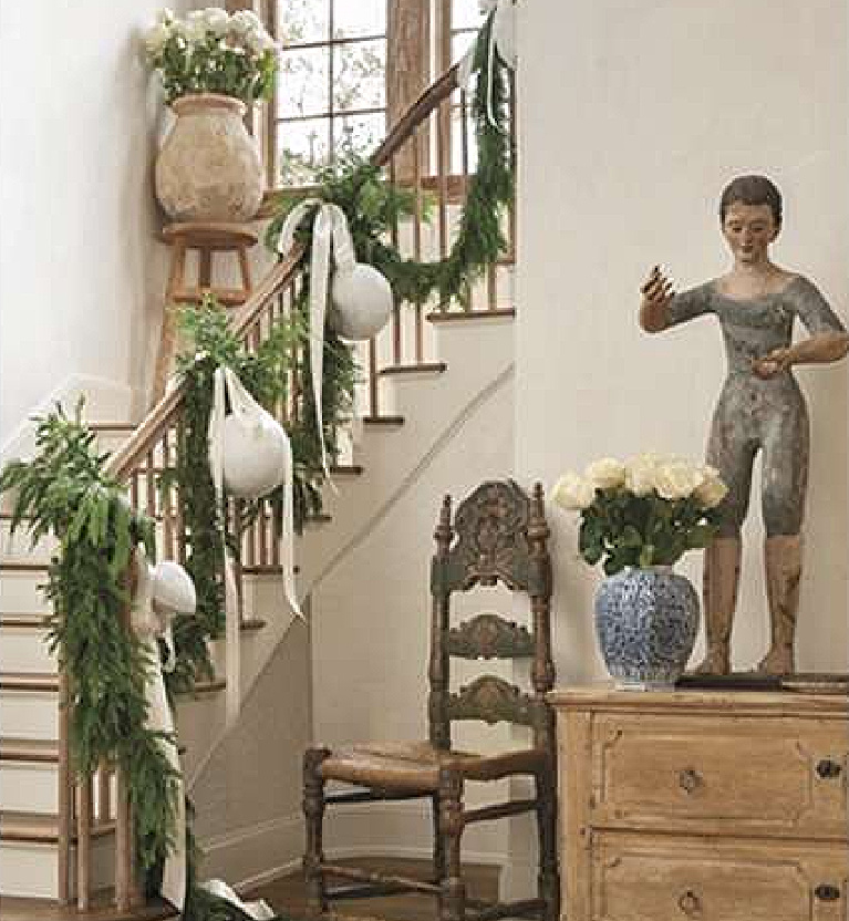 French country Christmas decorated staircase in the breathtaking Houston home of Pamela Pierce for Milieu magazine - photo by Peter Vitale.