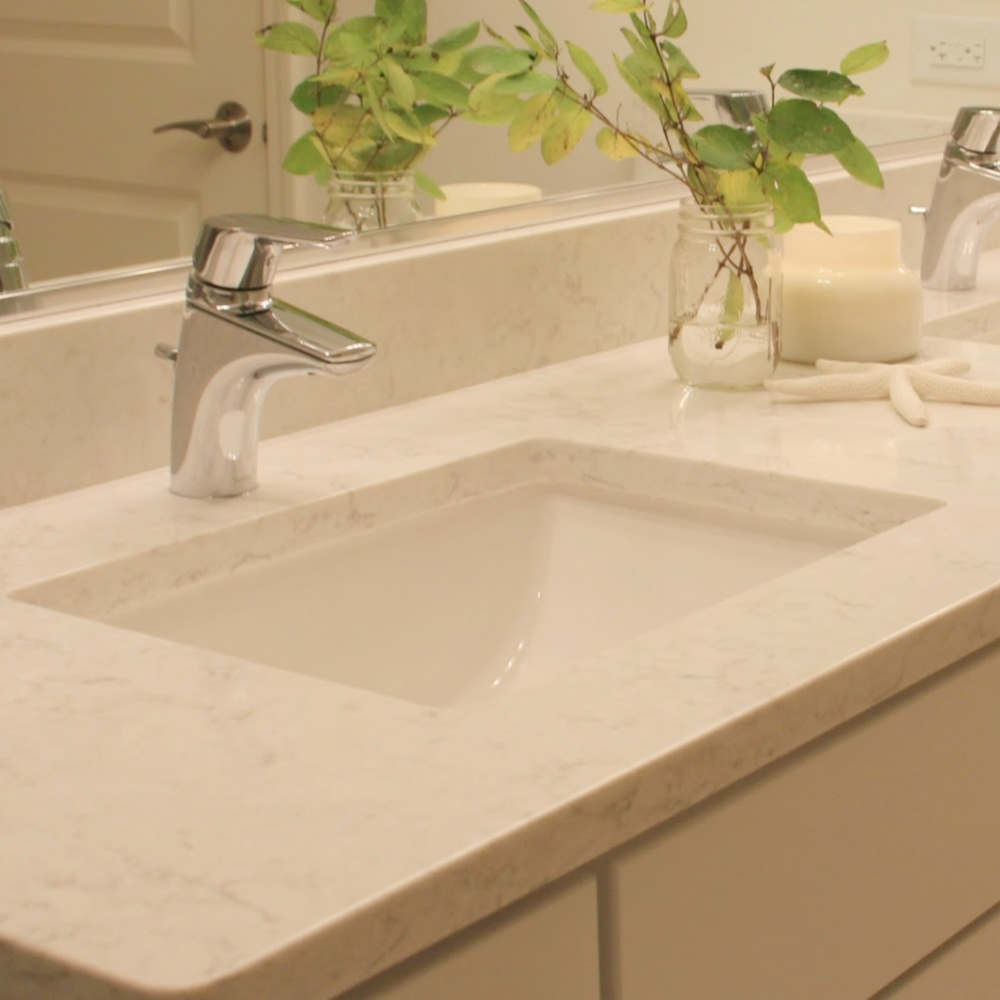 Minuet (Viatera quartz) countertops on bathroom vanity - Hello Lovely Studio.