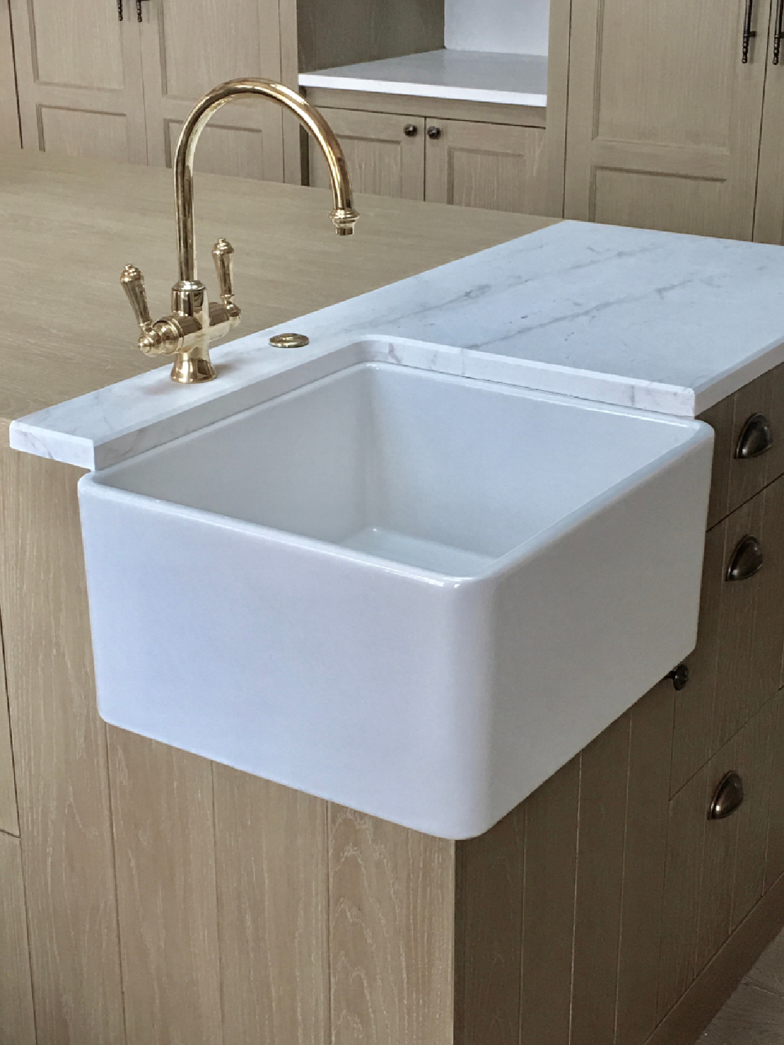 Detail of secondary sink in kitchen - Steve Giannetti designed modern Mediterranean Malibu home with white oak, natural finishes, limestone, and Old World style. #giannettihome #patinastyle #patinahomes