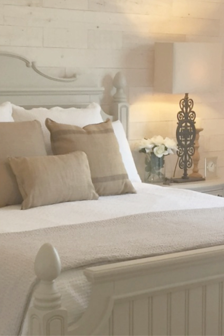 Stikwood Hamptons reclaimed pine peel and stick wood statement wall in our white French country romantic bedroom - Hello Lovely Studio. #frenchcountry #hellolovelystudio #bedroomdecor #stikwood #hamptons #shiplap #woodplank #statementwall