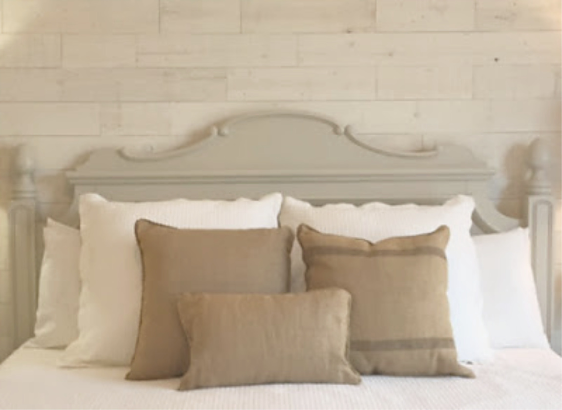 Stikwood Hamptons reclaimed pine peel and stick wood statement wall in our white French country romantic bedroom - Hello Lovely Studio. #frenchcountry #hellolovelystudio #bedroomdecor #stikwood #hamptons #shiplap #woodplank #statementwall