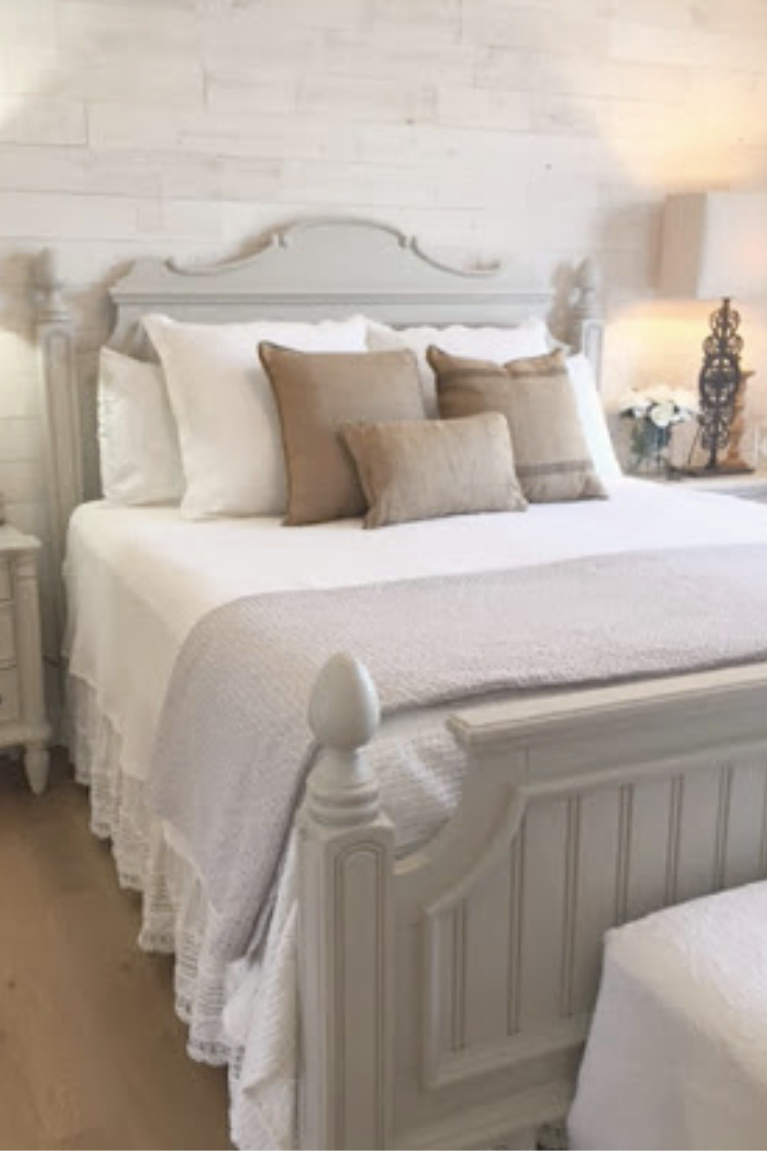 Stikwood Hamptons reclaimed pine peel and stick wood statement wall in our white French country romantic bedroom - Hello Lovely Studio. #frenchcountry #hellolovelystudio #bedroomdecor #stikwood #hamptons #shiplap #woodplank #statementwall