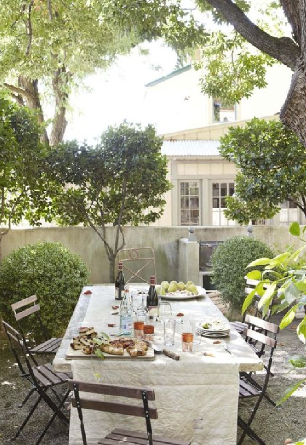 Interior designer Myra Hoefer's beautiful 1935 California cottage with Parisian interiors and French inspired gardens.