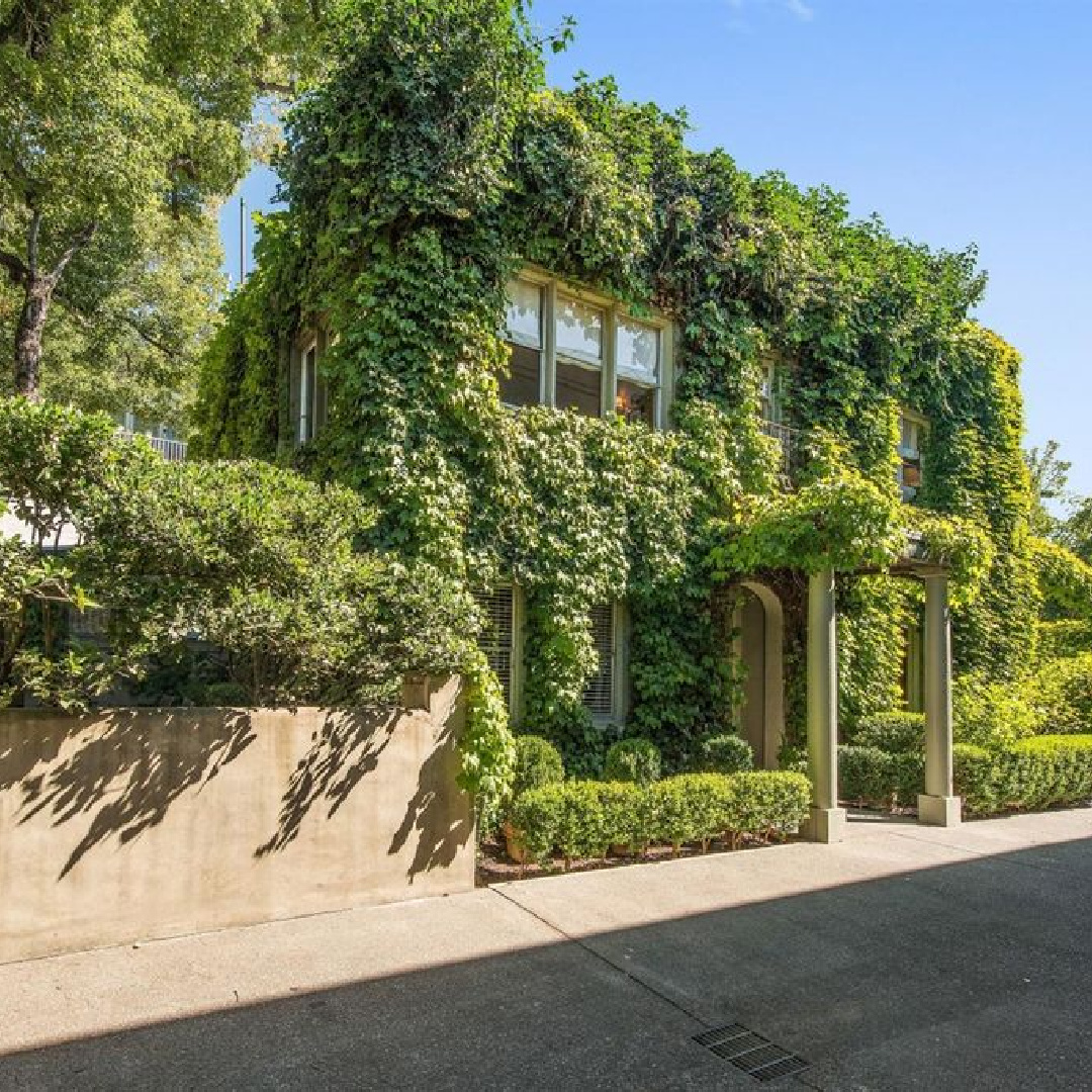 Vine covered exterior of interior designer Myra Hoefer's beautiful 1935 California cottage with Parisian interiors and French inspired gardens.