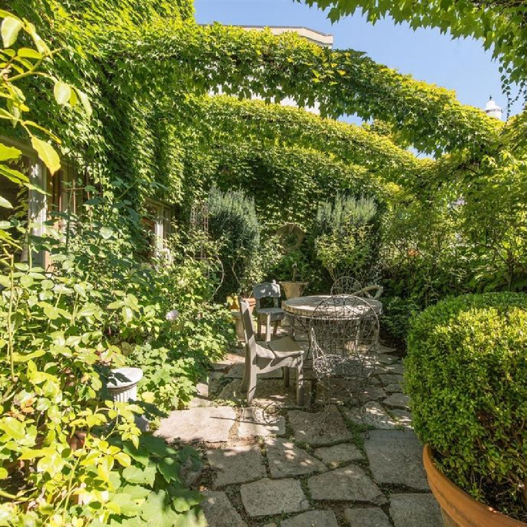 Interior designer Myra Hoefer's beautiful 1935 California cottage with Parisian interiors, antiques, and French inspired gardens.