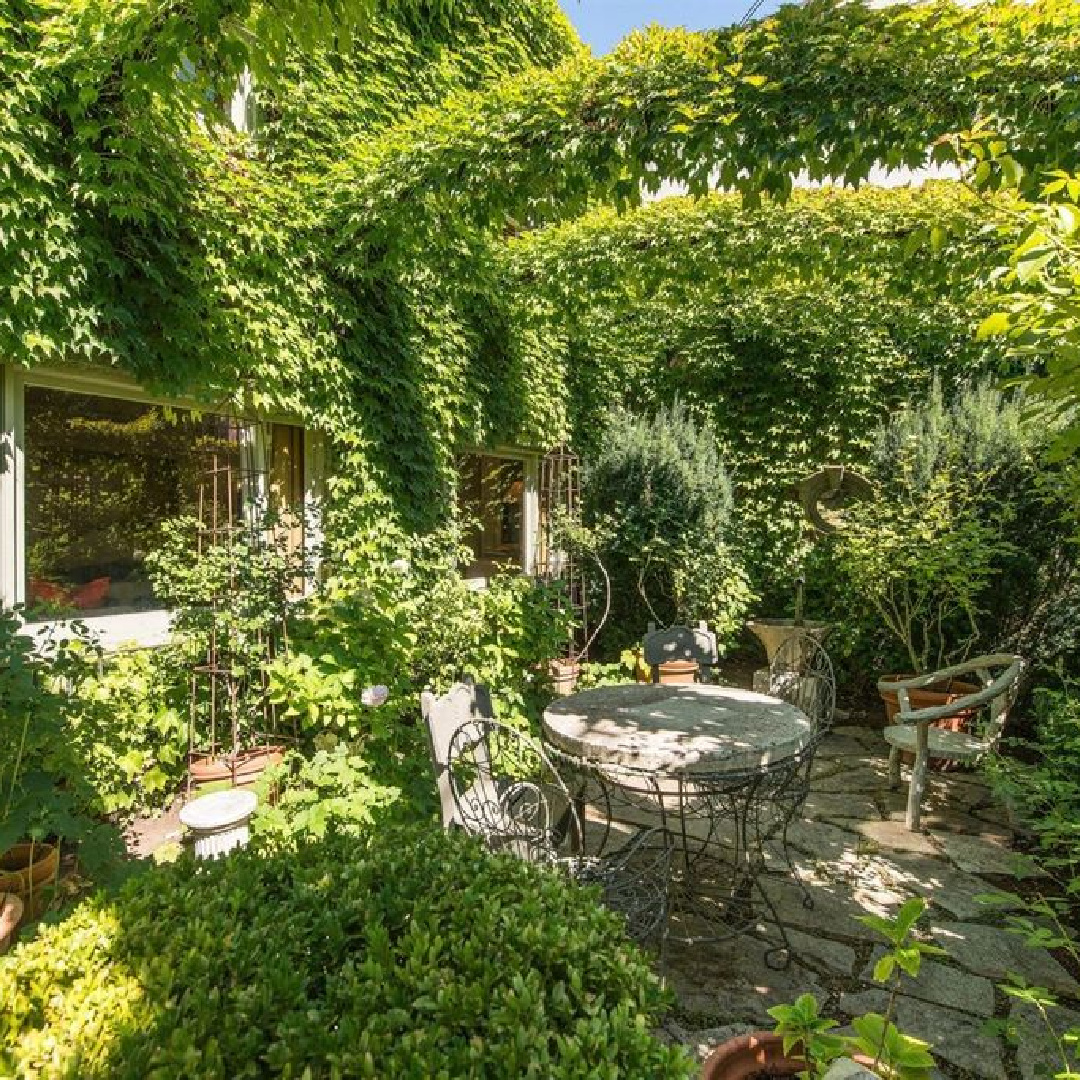 Interior designer Myra Hoefer's beautiful 1935 California cottage with Parisian interiors, antiques, and French inspired gardens.