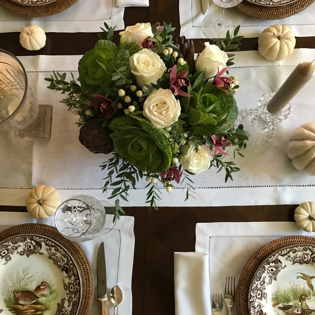 White roses in fall floral arrangement