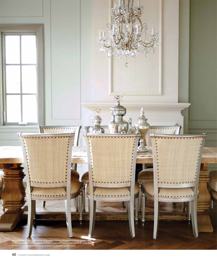 Beautifully serene and quiet dining room with French dining chairs with nailhead trim, chandelier, and stunning French fireplace. Decor de Provence. #FrenchCountry #diningroom #pedestaltable