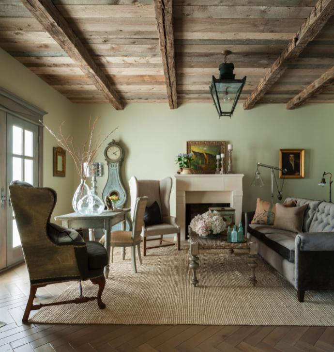 Decor de Provence French country, European inspired cozy cottage with reclaimed wood ceiling in living room with Swedish mora clock.