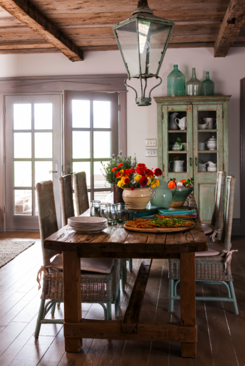 Rustic French farmhouse style dining room with lantern on Hello Lovely Studio