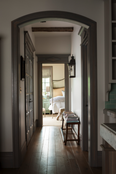 Arched doorway in French Country cottage on Hello Lovely