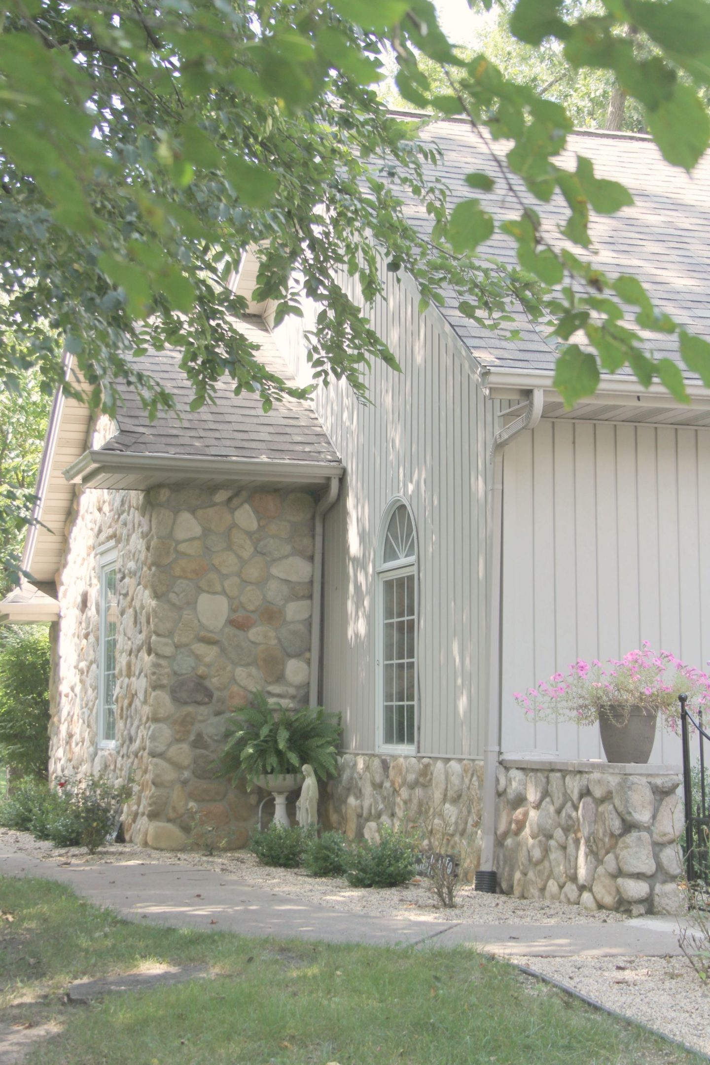 Exterior of our Nordic style cottage exterior with French Courtyard. Hello Lovely Studio.