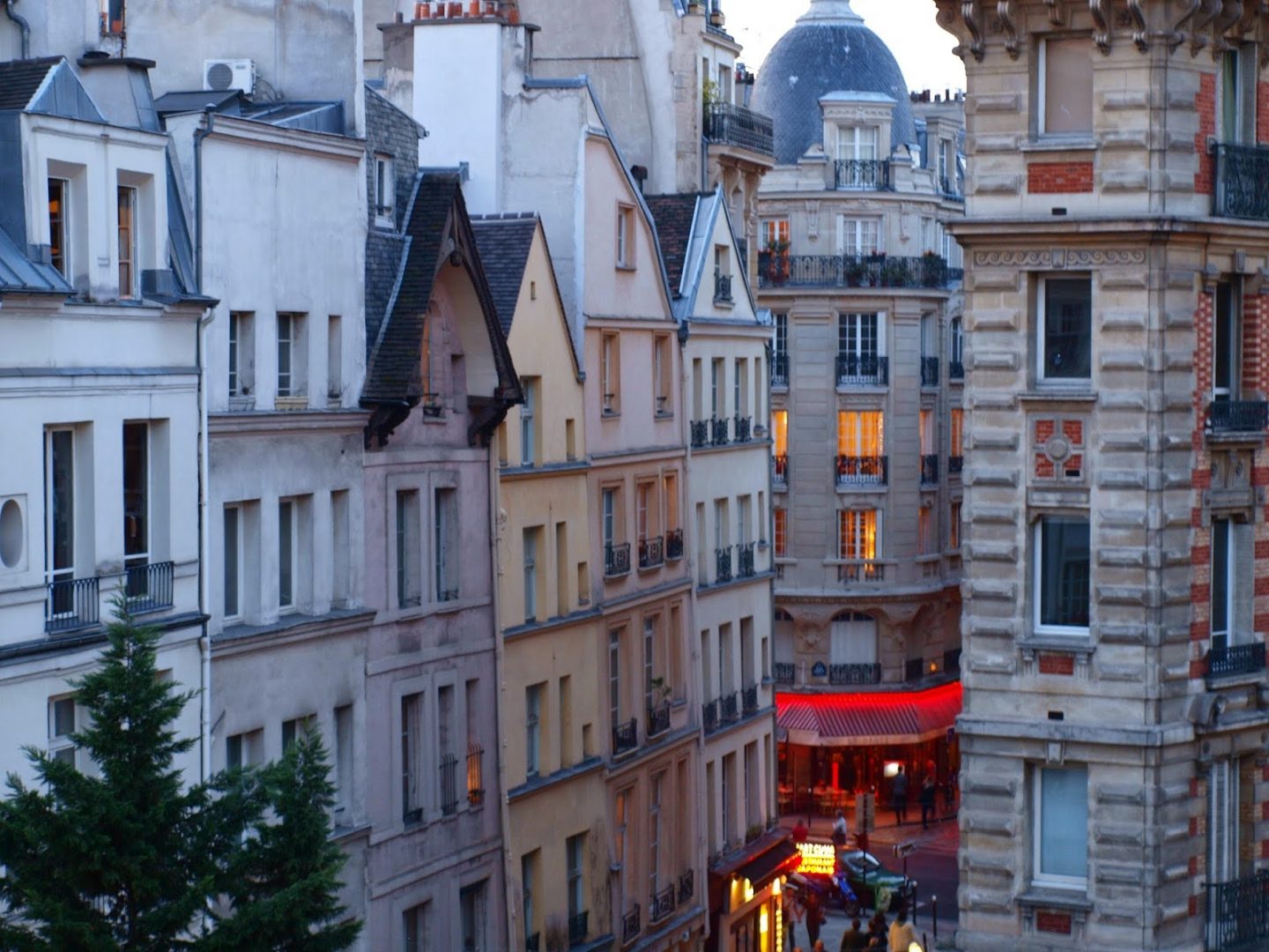 Paris apartment buildings at twilight. Hello Lovely Studio.