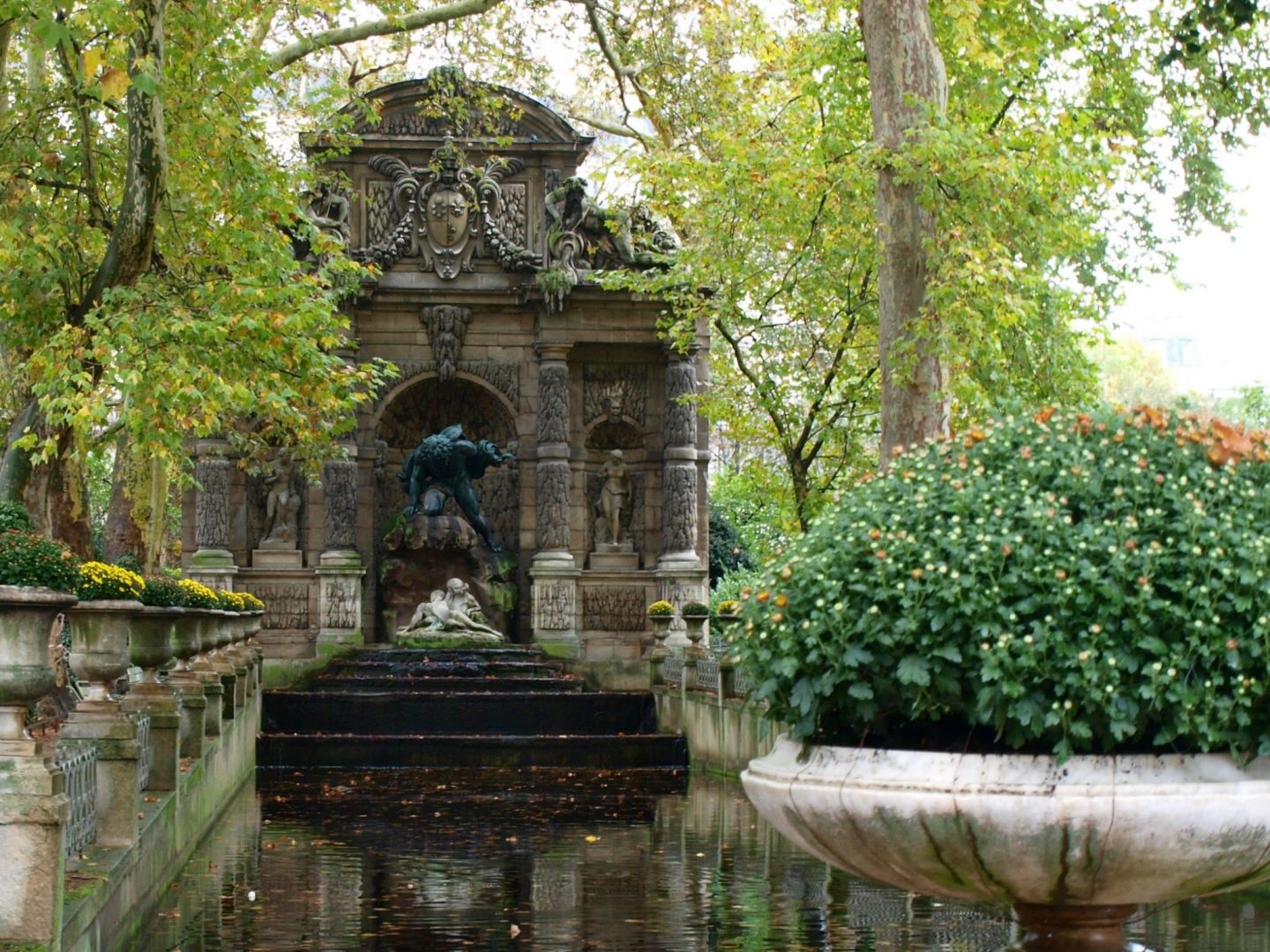 Beautiful pond at Luxembourg Gardens in Paris in fall by Hello Lovely Studio