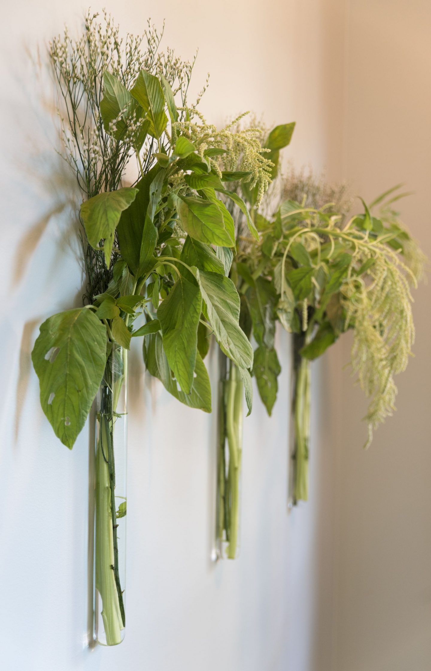 Enchanting and organic wall vases in foyer designed by Kate Ladd for O'More Show House