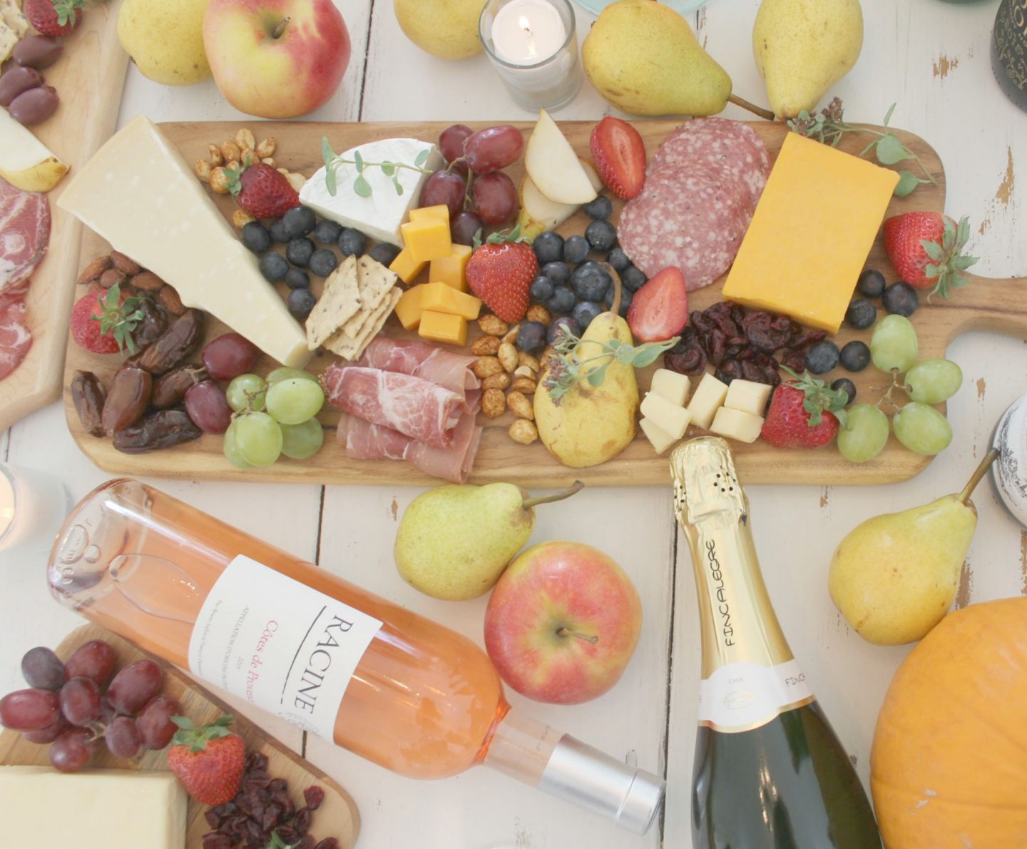 Gorgeous graze and cheese boards and charcuterie platters with wine for a party by Hello Lovely Studio