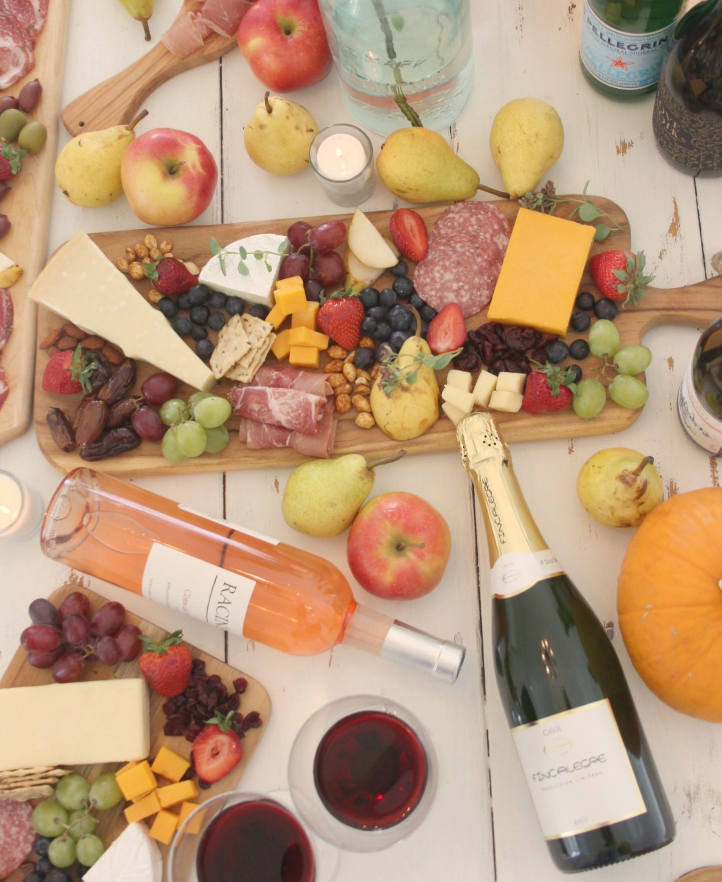 Gorgeous graze and cheese boards and charcuterie platters with wine for a party by Hello Lovely Studio