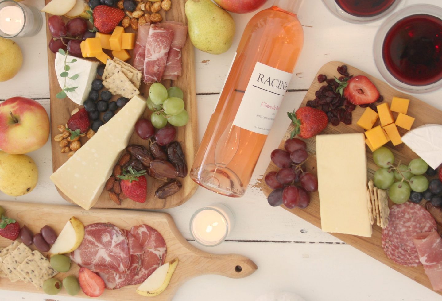 Gorgeous graze and cheese boards and charcuterie platters with wine for a party by Hello Lovely Studio