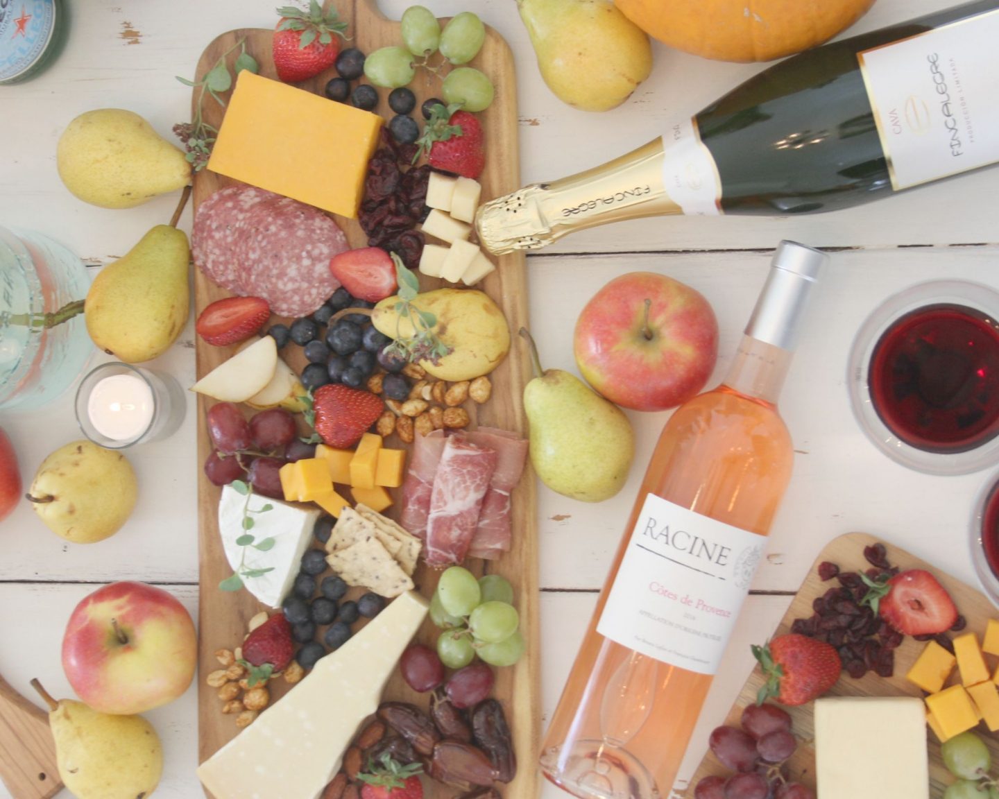 Gorgeous graze and cheese boards and charcuterie platters with wine for a party by Hello Lovely Studio