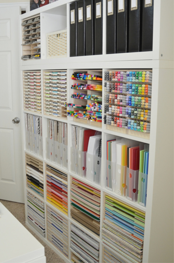 Kallax from Ikea is put to work in a craft room to store markers, paper and all sorts of supplies in a beautiful way - StampnStorage. #kallax #storage #organization #craftroom #diy #ikeahacks