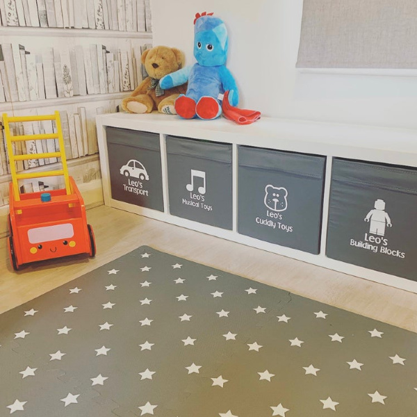 Kallax shelf hack for a kids room with custom stickers from DaisyDesignsBespoke on Etsy. #kidsroom #storage #homedecor #kallax #ikeahacks