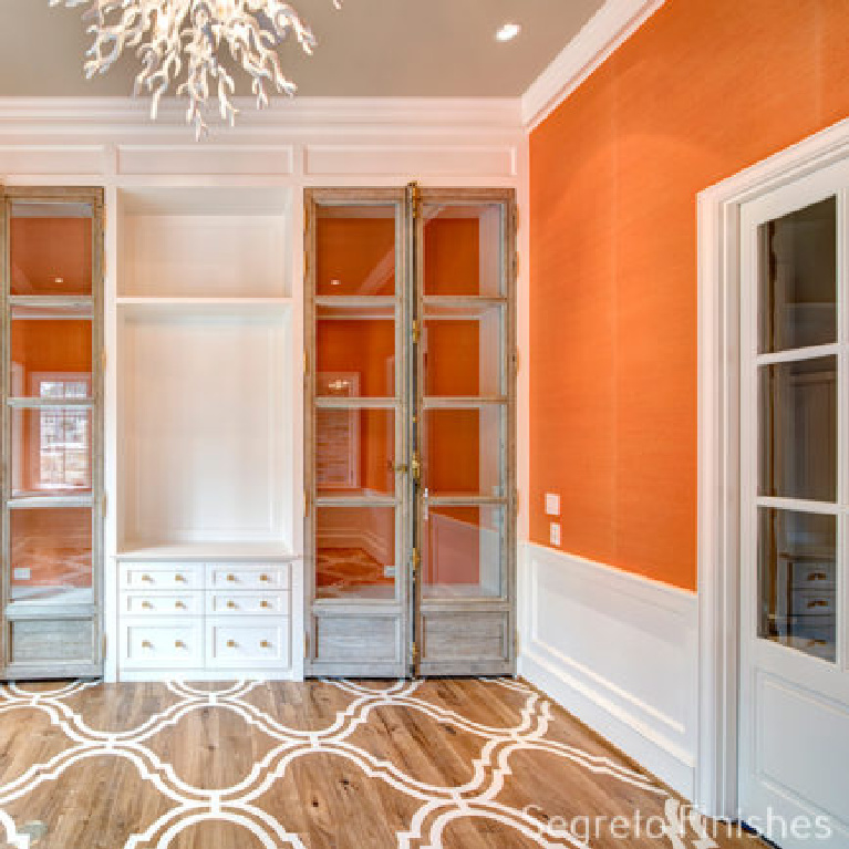 Vibrant orange walls in a space with Segreto Finishes (beautiful wall colors and plaster) in a lovely designed room in Leslie Sinclair's book. #plasterwalls #segretofinishes #orangewalls