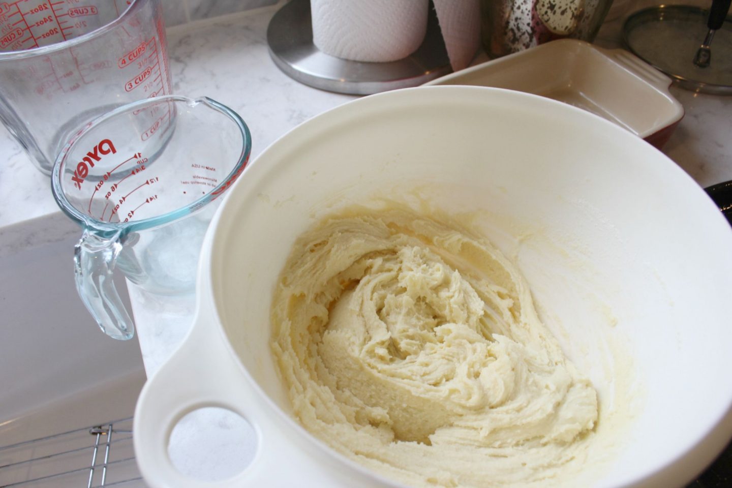 White mixing bowl of sugar cookie dough - Hello Lovely Studio