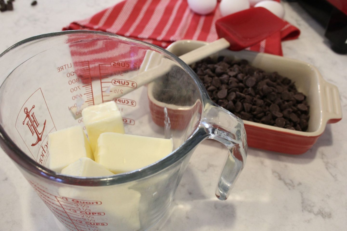 Butter and chocolate chips on counter