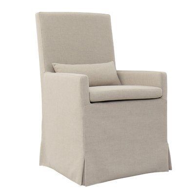 For a European country sophisticated look in your dining room, a linen slipcover #diningchair is as comfy as it is stylish. #modernfarmhouse #Belgianlinen