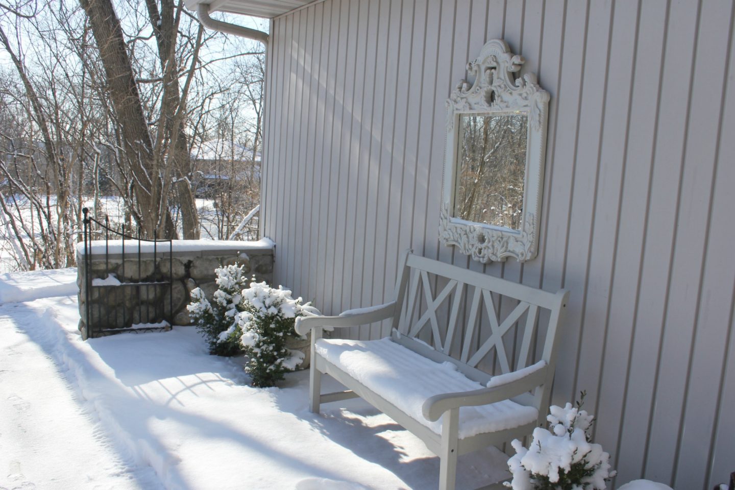 Snowy exterior of our cozy home in winter - Hello Lovely Studio.