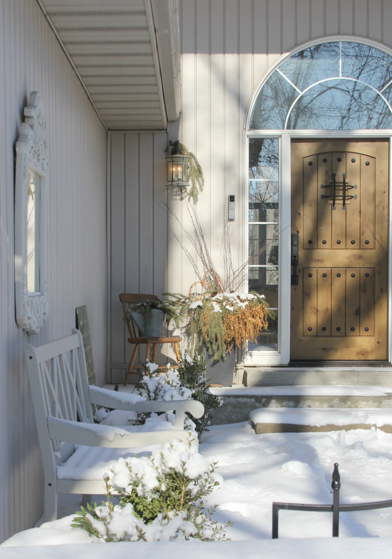 Snowy exterior of our cozy home in winter - Hello Lovely Studio.