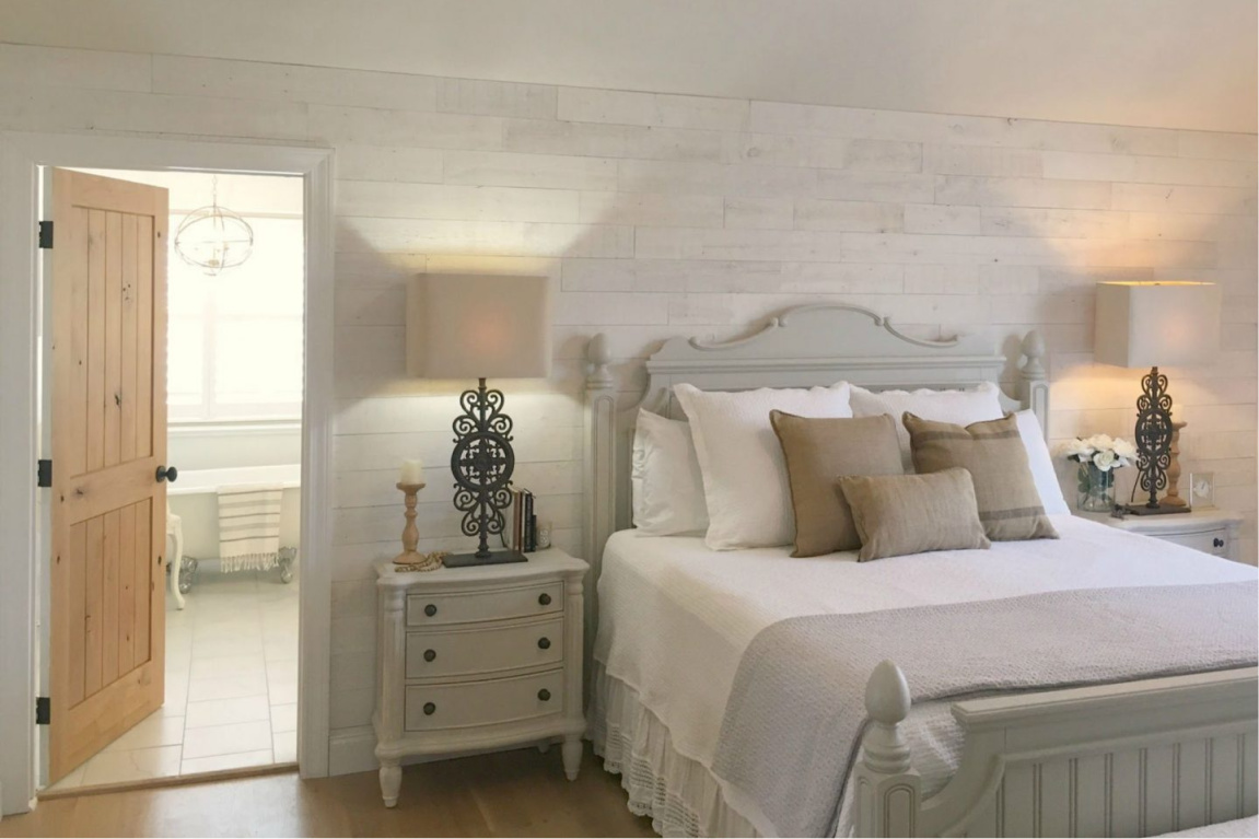 French country bedroom with cottage style furniture and rustic white Stikwood (Hamptons) wood plank wall. #hellolovelystudio #frenchcountry #bedroomdecor #stikwood #hamptons #frenchfarmhouse #allwhite #interiordesign