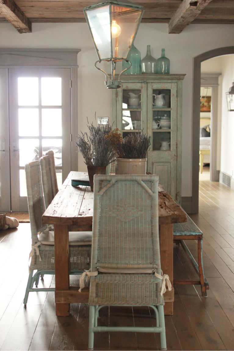 Rustic dining in Country French Old World style in a newly built custom cottage home in Utah - Score decorating ideas with blue & green from Decor de Provence. #countryfrench #interiordesign #oldworldstyle #europeancountry