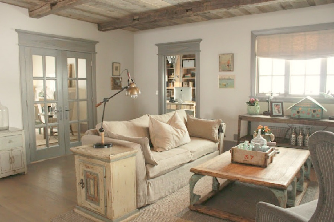Serene living room with blue grey stained trim in Country French Old World style in a newly built custom cottage home in Utah - Score decorating ideas with blue & green from Decor de Provence. #countryfrench #interiordesign #oldworldstyle #europeancountry