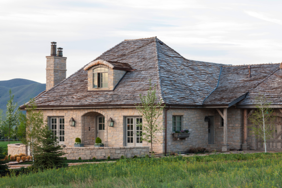 Exquisite French country with Gustavian influence cottage exterior in Utah - Decor de Provence. #frenchcottage #frenchnordic #frenchcountry #houseexteriors