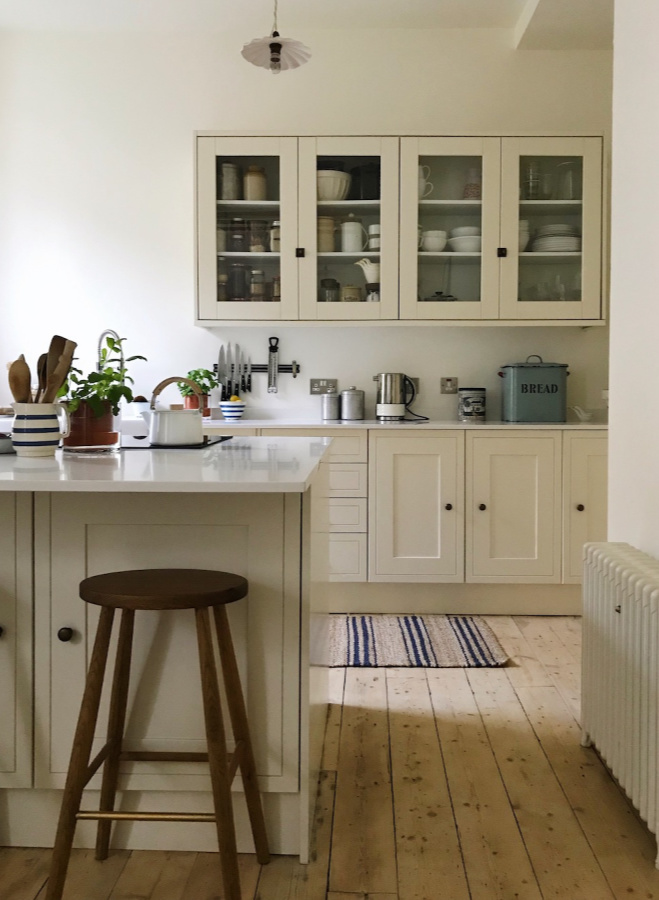 Wimborne White paint color by Farrow & Ball on walls of a glorious country kitchen by Siobhan McFadden of Homestead. #wimbornewhite #farrowandball #paintcolors #whitepaintcolors #interiordesign