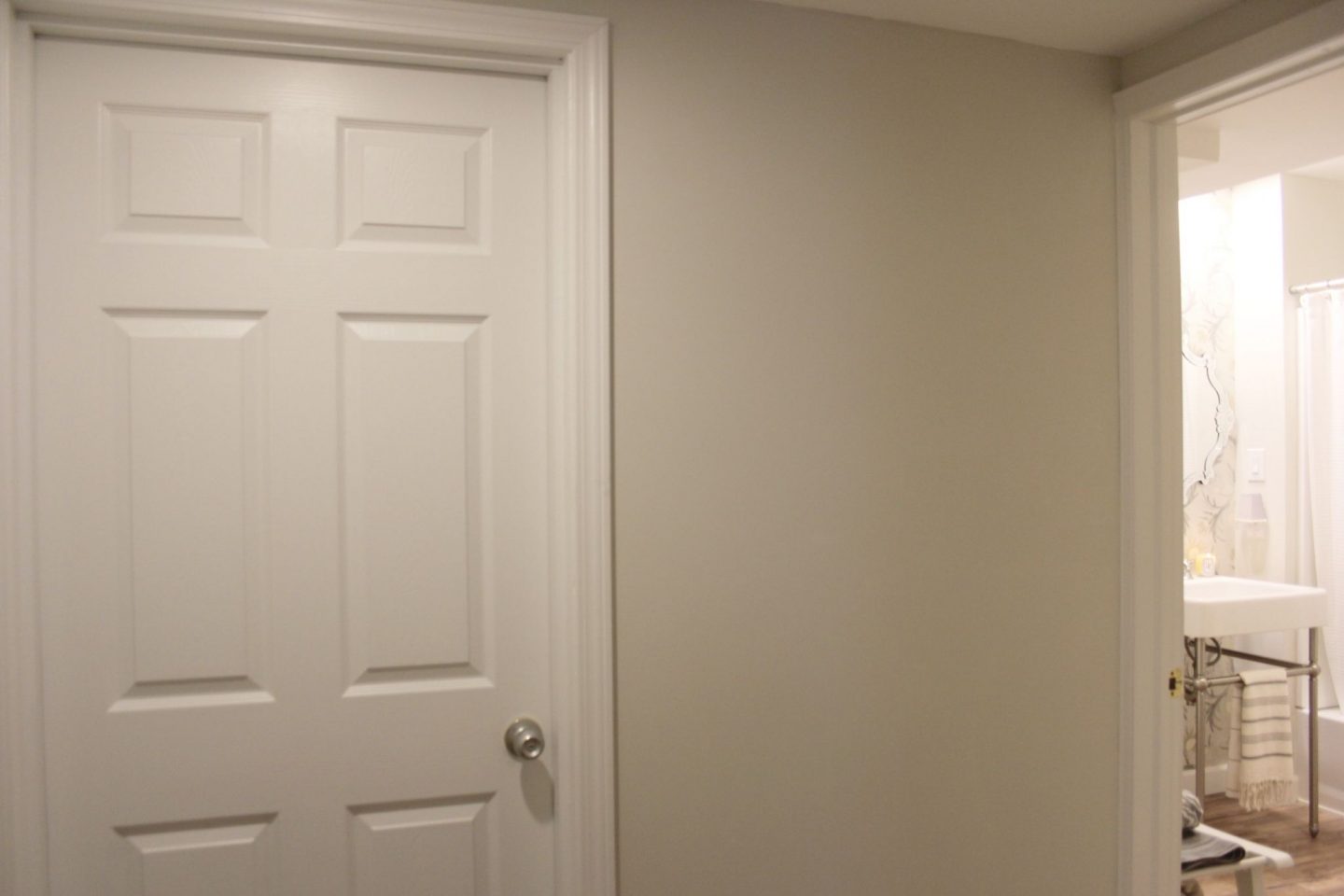 DIY Bathroom design: We carved out a brand new bathroom with console sink and pretty classic decor in a formerly dark dungeon basement. #DIYbathroom #bathroomdesign #beforeandafter