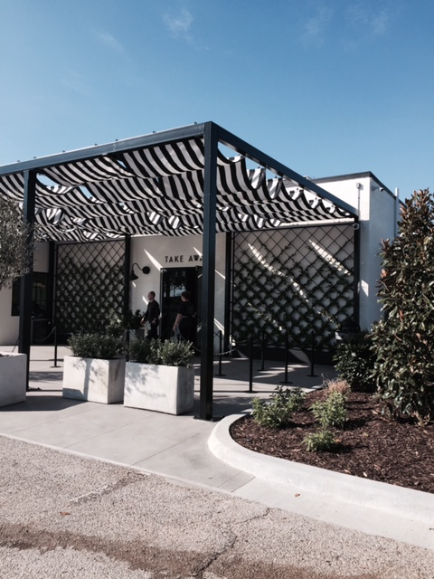 Magnolia Table outdoor take away area with black and white. #magnoliatable #blackandwhite #patio