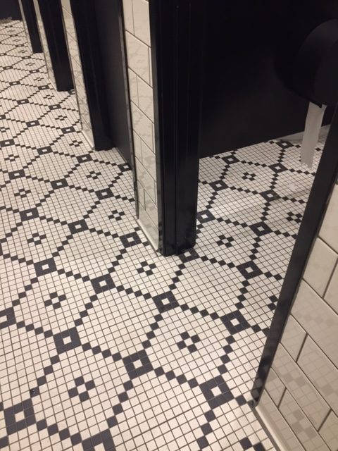 Black and white floor tile at Magnolia Table restaurant. #magnoliatable