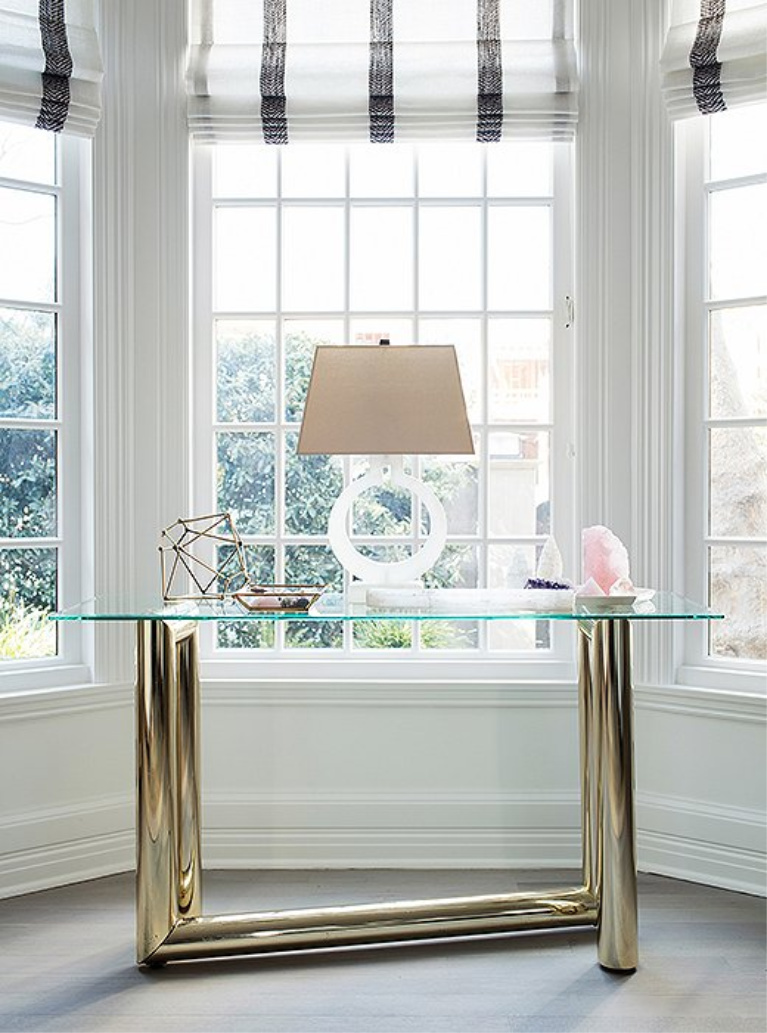 Karl Springer table with lamp and crystals in a modern vignette in Erin Fetherston's modern luxe California farmhouse living room. #consoletables #midcentury #modernfurniture #interiordesign