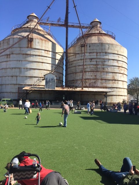 The Silos at Magnolia Market in Waco, Texas - a charming turf area for children and families to relax and play! #magnoliamarket #silos #turf #fixerupper