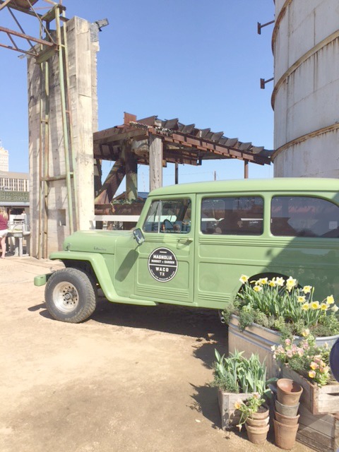 Green vintage car at Magnolia Market at the Silos. #magnoliamarket #waco