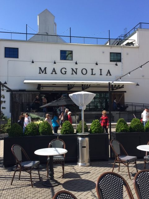 Magnolia Market at the Silos outdoor cafe area near the bakery with Parisian bistro chairs and marble topped tables. #magnolia #visit #Waco
