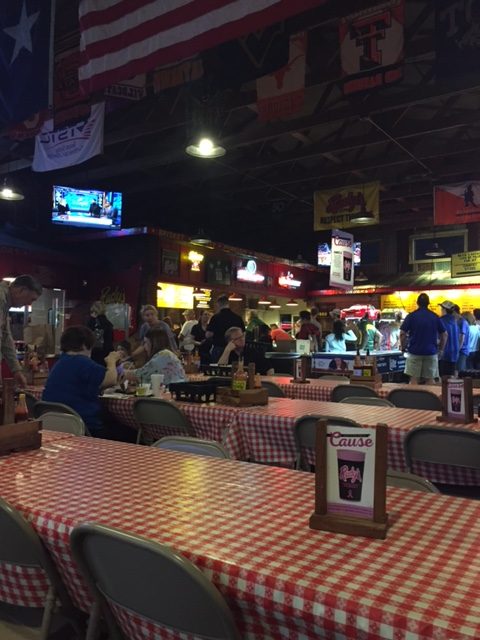 Rudy's BBQ restaurant interior with red and white check tablecloths. #rudys #waco