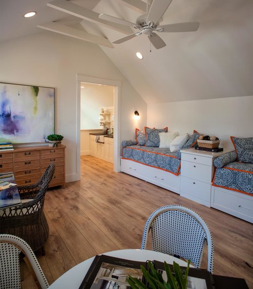 Blue bunk room in carriage house. Board and batten coastal cottage in Palmetto Bluff with modern farmhouse interior design by Lisa Furey.