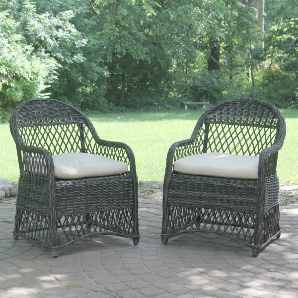 Belgian stone patio with dark grey rattan chairs. Hello Lovely Studio. #rattan #patio #chairs