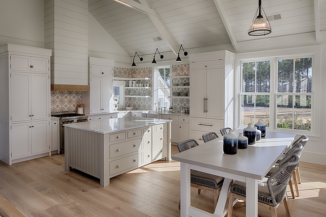 Kitchen. Board and batten coastal cottage in Palmetto Bluff with modern farmhouse interior design by Lisa Furey.