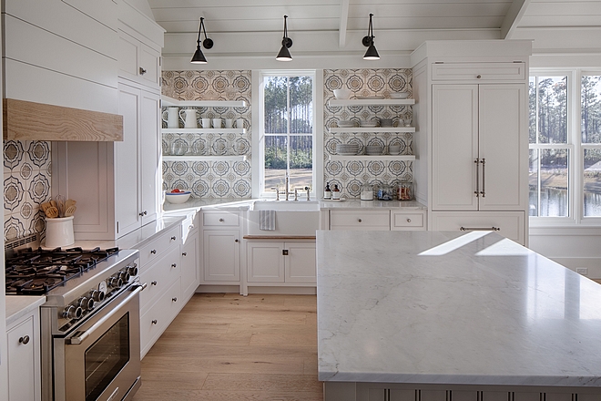 Kitchen. Board and batten coastal cottage in Palmetto Bluff with modern farmhouse interior design by Lisa Furey.