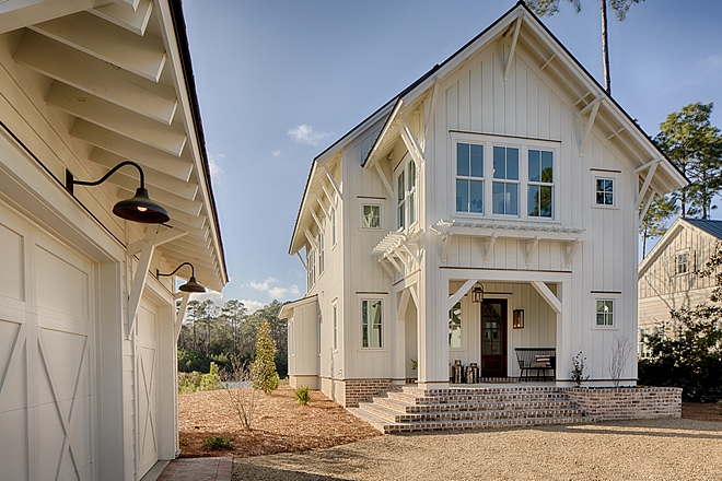 Board and batten coastal cottage in Palmetto Bluff with modern farmhouse interior design by Lisa Furey.